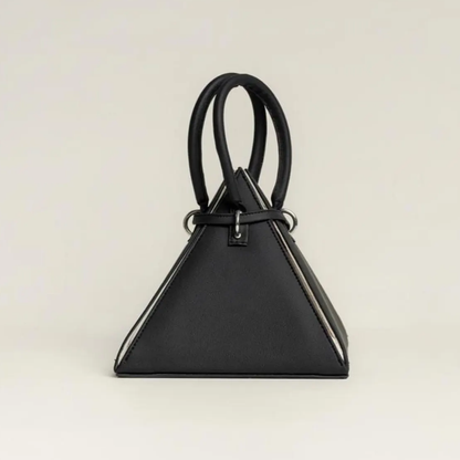 Jet Black Rigid Triangular Pyramid Handbag With Light Contrast Edge Stitching, Padded Dual Top Grips And Metallic Ring Front Fastening Strap