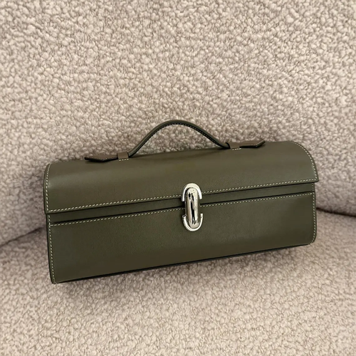 Muted Olive Grey Slim Elongated Rectangular Handheld Case With Contrast Light Stitching, Oval Metallic Twist Lock And Fixed Curved Top Carry Grip