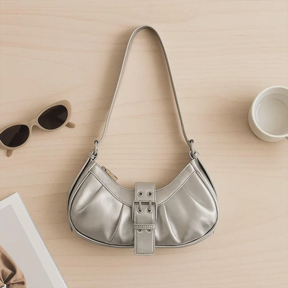 Metallic Silver & Glossy Black Curved Crescent Shoulder Pouch With Side Gathered Pleats, Dual-Bar Metal Buckle Tab And Slim Single Shoulder Strap Hardware