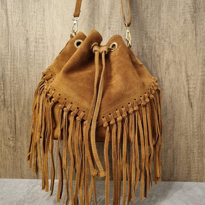 Warm Caramel Tan Slouchy Fringe Trim Bucket Pouch With Drawstring Eyelet Closure, Polished Side Clasps And Single Lengthy Hanging Strap