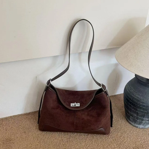 Deep Chocolate Brown Curved Hobo Carryall With Textured Front Panels, Smooth Bottom Trim And Rectangular Metallic Flap Twist Lock