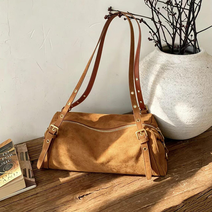 Warm Tan Brown Elongated Rectangular Shoulder Pouch With Full-Length Metallic Slide Seal, Eyelet Lined Carry Strips And Polished Gold Toned Buckle Hardware