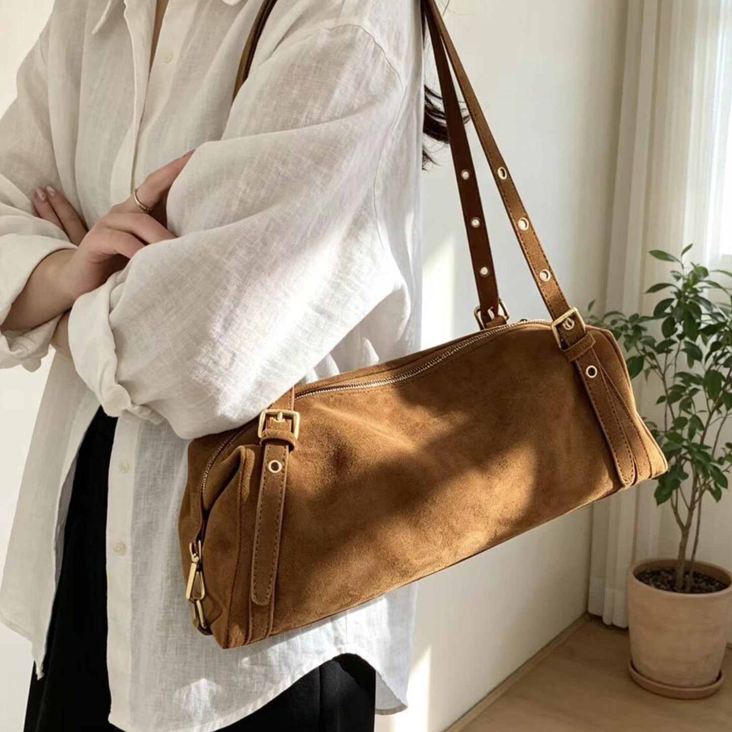 Warm Tan Brown Elongated Rectangular Shoulder Pouch With Full-Length Metallic Slide Seal, Eyelet Lined Carry Strips And Polished Gold Toned Buckle Hardware
