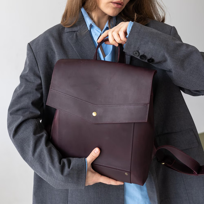 Deep Plum Brown Structured Square Backpack With V-Cut Flap Stud Closure, Rear Horizontal Zip Pocket And Wide Slider-Equipped Shoulder Straps