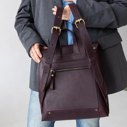 Deep Plum Brown Structured Square Backpack With V-Cut Flap Stud Closure, Rear Horizontal Zip Pocket And Wide Slider-Equipped Shoulder Straps
