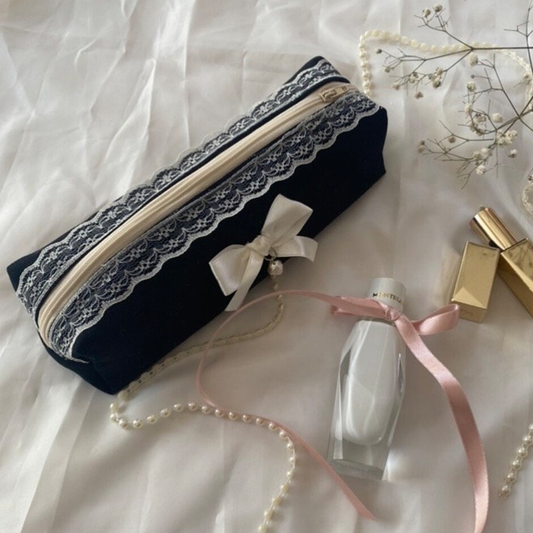 Deep Black Slim Elongated Zip Pouch With Scalloped Pale Lace Trim, Off-White Fabric Bow Bead Charm And Pale Lined Spacious Inner Compartment