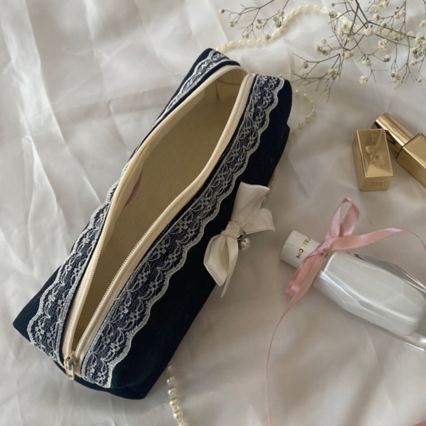 Deep Black Slim Elongated Zip Pouch With Scalloped Pale Lace Trim, Off-White Fabric Bow Bead Charm And Pale Lined Spacious Inner Compartment