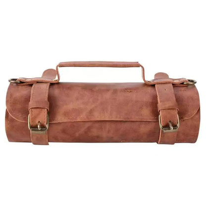 Warm Vintage Tan Rolled Cylindrical Tool Storage Case With Dual Antique Buckle Straps, Integrated Top Carry Strip And Multi-Slot Inner Implement Compartments