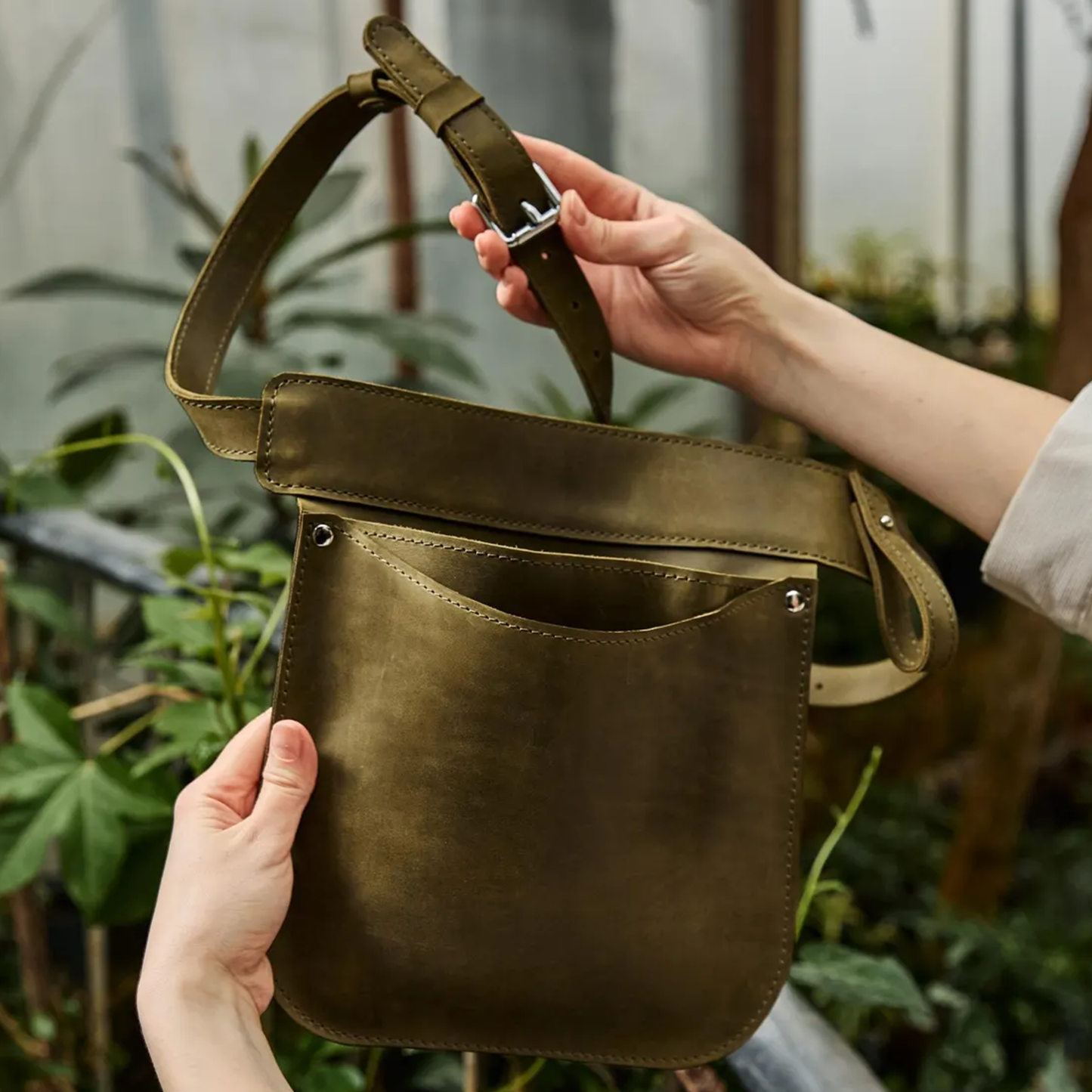 Muted Olive Green Trapezoid Waist Tool Pouch With Layered Open Storage Slots, Wide Sliding Clasp Strap And Polished Metal Connection Fasteners